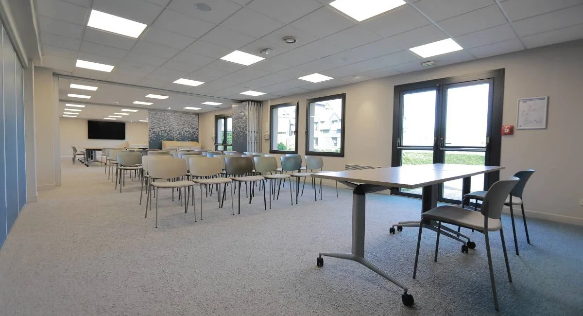 Seminar room at Hotel Antares in Honfleur arranged in conference layout for meetings and business events